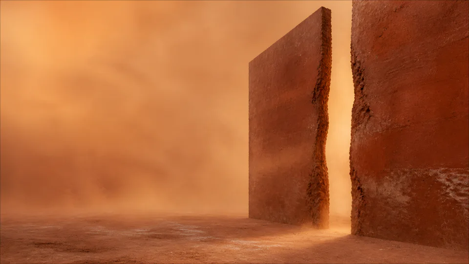 Two rammed-earth planes divide a field of terracotta dust and late mineral light.
